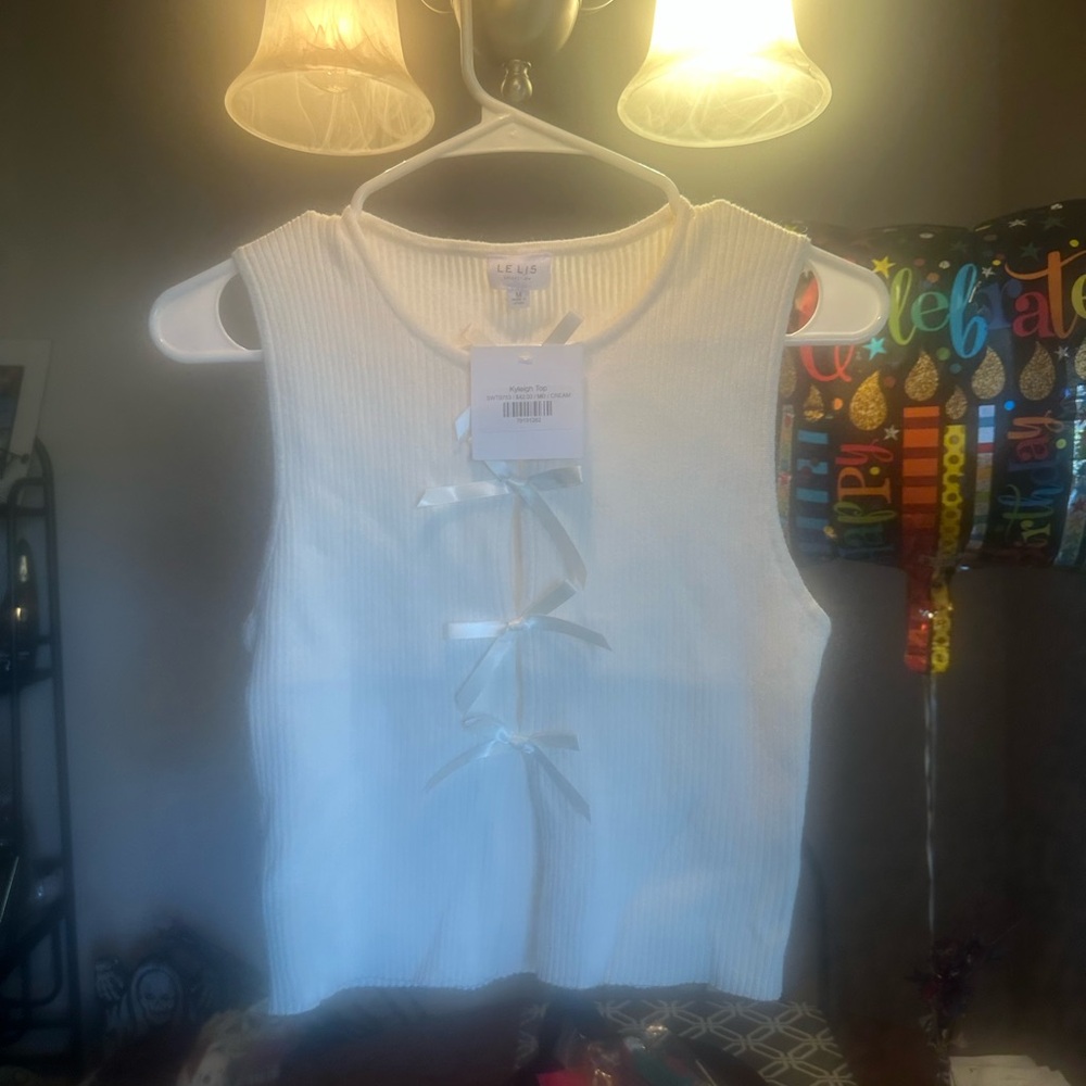White Sleeveless Top with Bow Details